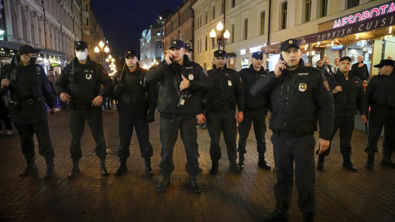 Riot police block a street during a protest against mobilization in Moscow, Russia, Wednesday, Sept. 21, 2022. (AP Photo/Alexander Zemlianichenko)