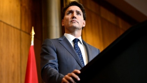 Prime Minister Justin Trudeau listens to ministers as they speak via videoconference during a news conference on the federal government's response to Hurricane Fiona, in Ottawa, on Saturday, Sept. 24, 2022. THE CANADIAN PRESS/Justin Tang
