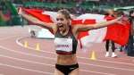 Natasha Wodak of Canada celebrates winning the gold medal in the women's 10,000m final during the athletics at the Pan American Games in Lima, Peru on Aug. 6, 2019. (AP Photo/Martin Mejia)