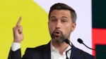 Quebec Solidaire co-spokesperson Gabriel Nadeau-Dubois speaks to the Congress of the Quebec Federation of Municipalities while campaigning Friday, September 23, 2022 in Montreal. Quebec votes in the provincial election Oct. 3, 2022. THE CANADIAN PRESS/Ryan Remiorz