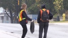 Members of the EcoHawks cleaning up garbage after homecoming weekend in Waterloo. Sep 25, 2022. (Colton Wiens/CTV News Kitchener)
