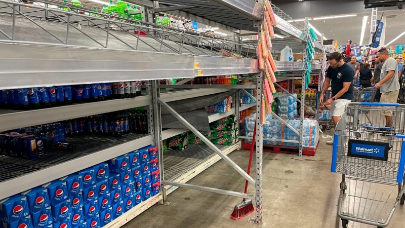 Emptying the shelves of a Walmart Supercenter in Tampa, Fla., on Sept. 25, 2022. (Matt Cohen / Tampa Bay Times via AP) 