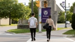 Students walk at the Western University campus in London, Ont. on Wednesday, September 15, 2021. THE CANADIAN PRESS/Nicole Osborne