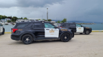 Multiple OPP cruisers are seen at the marina in the Municipality of Meaford for an ongoing investigation involving a submerged vehicle on September 25, 2022. (Source: West Region OPP/Twitter)