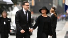 Conservative Party Leader Pierre Poilievre and his wife Anaida Poilievre arrive at Christ Church Cathedral for the National Commemorative Ceremony in honour of Queen Elizabeth, in Ottawa, on Monday, Sept. 19, 2022. THE CANADIAN PRESS/Justin Tang