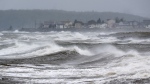 Waves pound the shore in Eastern Passage, N.S. on Saturday, Sept. 24, 2022. THE CANADIAN PRESS/Andrew Vaughan