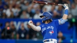 Toronto Blue Jays shortstop Bo Bichette (11) at bat in the fourth inning American League MLB baseball action against the New York Yankees in Toronto on Monday, September 26, 2022. (THE CANADIAN PRESS/Cole Burston)