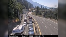 Vehicles are seen lined up on the Sea to Sky Highway in Lions Bay in an image from B.C. Highway Cams. (Ministry of Transportation)