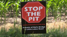 A "Stop the Pit" sign is seen on Little Lakes Road near Goderich, Ont. in June 2021. (Scott Miller/CTV News London)