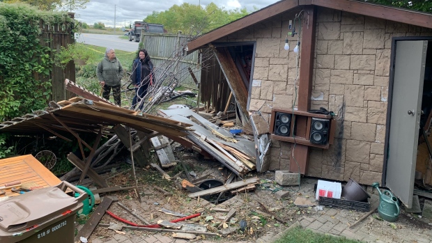 Residents are calling for traffic calming measures after a car crashed through the fence of two houses in Windsor, Ont. pictured on Tuesday, Sept. 27, 2022. (Chris Campbell/CTV News Windsor)