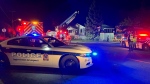 Longueuil police are investigating after two unoccupied homes were set on fire. (Cosmo Santamaria/CTV News)