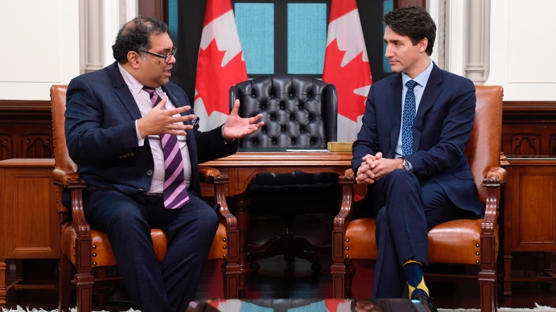 Prime Minister Justin Trudeau speaks with then-Calgary mayor Naheed Nenshi in his office on Parliament Hill in Ottawa on Thursday Nov. 21, 2019. THE CANADIAN PRESS/Adrian Wyld