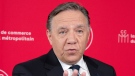 Coalition Avenir du Quebec leader Francois Legault speaks to the media while campaigning Wednesday, September 28, 2022 in Montreal. Quebec votes in the provincial election Oct. 3, 2022. THE CANADIAN PRESS/Ryan Remiorz