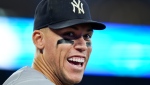 New York Yankees centre fielder Aaron Judge (99) smiles to the crowd during ninth inning American League MLB baseball action against the Toronto Blue Jays in Toronto on Tuesday, September 27, 2022. The New York Yankees officially clinched the American League East division title. THE CANADIAN PRESS/Nathan Denette