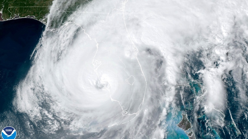 This satellite image taken at 3:06 p.m. EDT and provided by NOAA shows Hurricane Ian making landfall in southwest Florida near Cayo Costa on Wednesday, Sept. 28, 2022, as a catastrophic Category 4 storm. (NOAA via AP) 