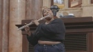 Lizzo plays 200-year-old crystal flute