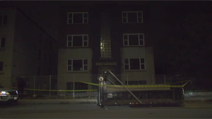 Ottawa police at an apartment building on Deschamps Avenue in Vanier Wednesday night, where human remains were uncovered. (Shaun Vardon/CTV News Ottawa)
