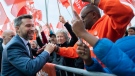 Quebec Solidaire leader Gabriel Nadeau-Dubois greets supporters as he arrives for a leaders debate in Montreal, Thursday, September 22, 2022. Quebecers will go to the polls on October 3rd. THE CANADIAN PRESS/Paul Chiasson