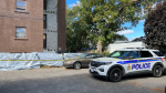 Ottawa police remained at a Vanier apartment building on Thursday, Sept. 29, 2022 after construction workers discovered apparent human remains. (Jeremie Charron/CTV News Ottawa)