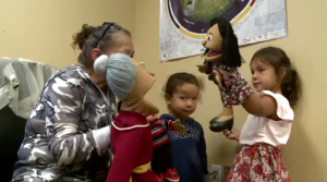 Katani Julian (left) teaches students like Piper (right) how to speak the Mi'kmaq language with tools such as puppets. (Source: Ryan Macdonald/ CTV News)