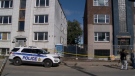 Police at the scene of a Vanier apartment building where human remains were found. (Christopher Black/CTV News Ottawa)