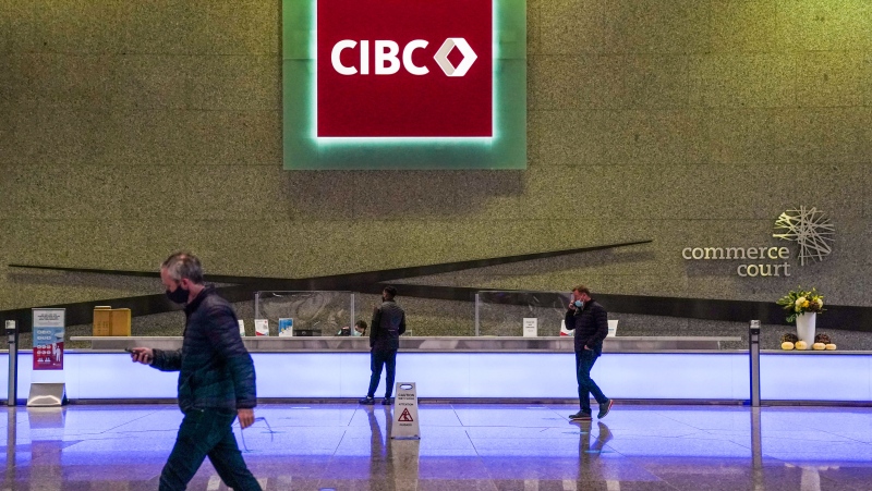 CIBC says it earned $1.67 billion in its third quarter, down from $1.73 billion in the same quarter last year. The new CIBC logo displayed the the lobby of its headquarters in Toronto on Monday, Oct. 25, 2021. THE CANADIAN PRESS/Evan Buhler