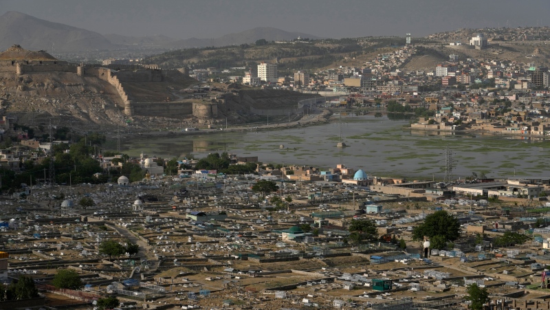 A view of a sprawling cemetery in Kabul, Afghanistan, Monday, May 9, 2022. AP Photo/Ebrahim Noroozi)