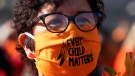 A person wears an "Every Child Matters," facemask during the National Day for Truth and Reconciliation in Ottawa on Thursday, Sept. 30, 2021. THE CANADIAN PRESS/Adrin Wyld