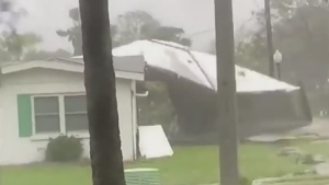 Roof ripped off home during storm in Naples, Fla.