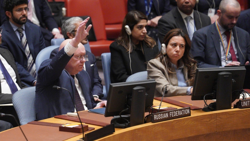 Russian Ambassador to the United Nations Vasily Nebenzya raises his hand against a UN Security Council vote on a draft resolution sanctioning Russia's planned annexation of war-occupied Ukraine territory, Friday Sept. 30, 2022 at U.N. headquarters. (AP Photo/Bebeto Matthews)