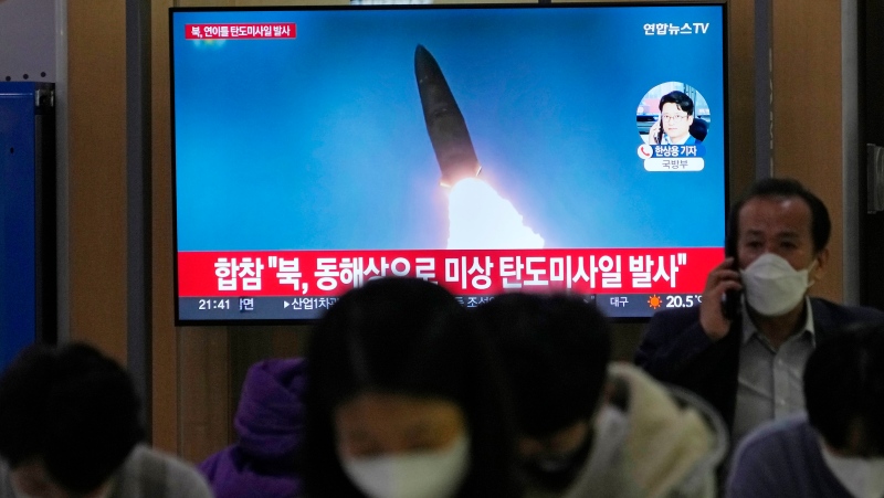 A TV screen shows a file image of North Korea's missile launch during a news program at the Seoul Railway Station in Seoul, South Korea, Thursday, Sept. 29, 2022. (AP Photo/Ahn Young-joon)