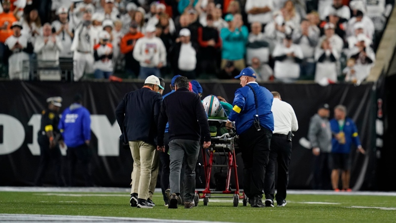 Miami Dolphins quarterback Tua Tagovailoa is taken off the field on a stretcher during the first half of an NFL football game against the Cincinnati Bengals, Thursday, Sept. 29, 2022, in Cincinnati. (AP Photo/Joshua A. Bickel)