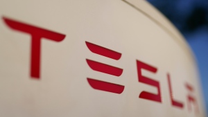 The logo for the Tesla Supercharger station is seen in Buford, Ga, April 22, 2021. (AP Photo/Chris Carlson, File)