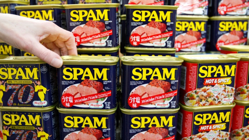 Cans of "Spam" luncheon meat are displayed at a market in Naha on the southern Japanese island of Okinawa March 5, 2008.
