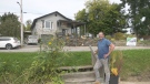 Kevin Lentz stands on his dock in front of his house on Madawaska Street in Calabogie, Ont. (Dylan Dyson/CTV News Ottawa)