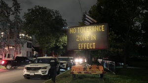 A sign in Sandy Hill says a "No Tolerance Zone in Effect", as police monitor post-Panda Game festivities. (Shaun Vardon/CTV News Ottawa) 