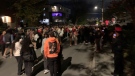Hundreds of people packed streets in Ottawa's Sandy Hill neighbourhood Saturday night as part of post-Panda Game celebrations. (Shaun Vardon/CTV News Ottawa)