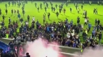 125 people killed in soccer riot and stampede