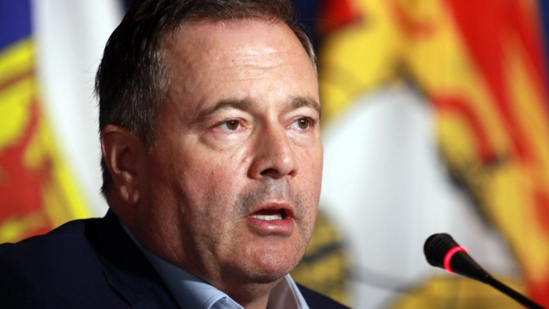 Alberta Premier Jason Kenney responds to a question from the media on the final day of the summer meeting of Canada's premiers at the Fairmont Empress in Victoria on July 12, 2022. United Conservative Party members will pick a new leader on Thursday. THE CANADIAN PRESS/Chad Hipolito