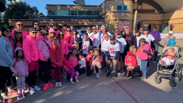 Team Leah poses for a photo prior to the CIBC Run for the Cure at Victoria Park in London, Ont.  Leah Warner was diagnosed with breast cancer two weeks ago. (Brent Lale/CTV London)