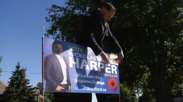 Two municipal candidates are at the centre of controversy for their use of the poppy on their campaign signs, with the Royal Canadian Legion requesting they be removed (Kraig Krause/CTV News). 