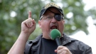 Stewart Rhodes, founder of the Oath Keepers, speaks during a rally outside the White House in Washington, June 25, 2017. (AP Photo/Susan Walsh, File)