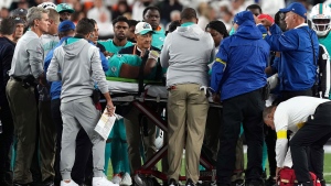Medical staff tend to Tagovailoa as he is carted off on a stretcher after an injury during the second quarter of the game against the Bengals. (Dylan Buell/Getty Images via CNN)

