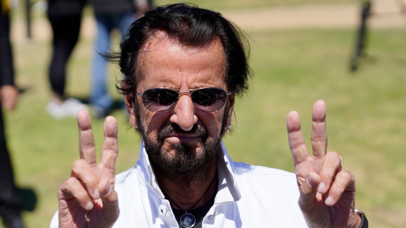 Ringo Starr flashes the peace sign during his annual Peace & Love Birthday Celebration, Thursday, July 7, 2022, in Beverly Hills, Calif. Starr celebrated his 82nd birthday Thursday. (AP Photo/Chris Pizzello)