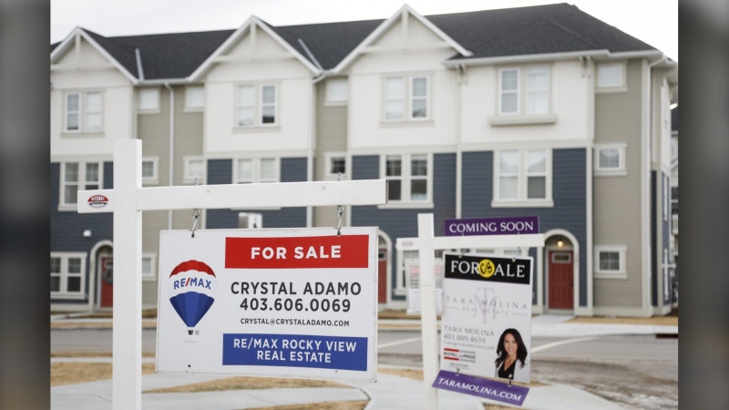 The Calgary Real Estate Board says home sales in the Alberta city for September were down nearly 12 per cent compared with the same month last year. (THE CANADIAN PRESS/Jeff McIntosh)