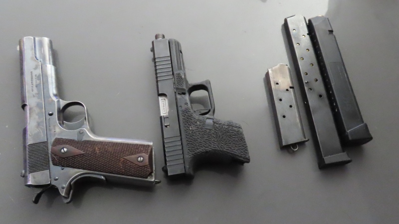 Handguns and magazines seizure during a Calgary drug trafficking investigation that resulted in 32 charges against Alexander Corbett. (CPS)