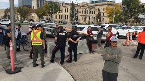 Members of the Winnipeg Police Service seen outside of the Manitoba legislature on Oct. 3, 2022. (image source: CTV News Winnipeg)