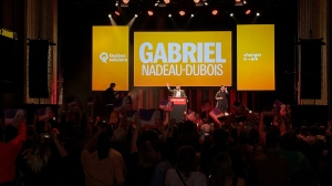 Gabriel Nadeau-Dubois speaks to his members after being re-elected in his Montreal-area riding. 