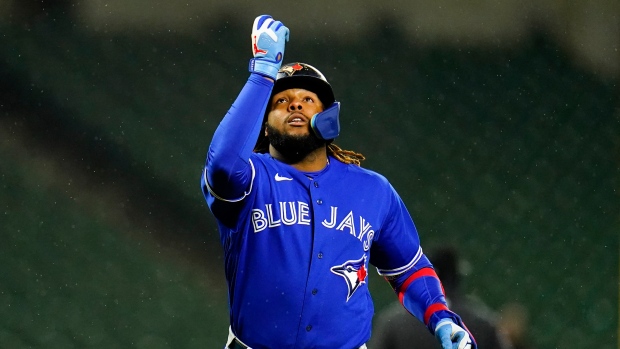 Toronto Blue Jays' Vladimir Guerrero Jr. reacts after hitting a solo home run against the Baltimore Orioles during the third inning of a baseball game, Monday, Oct. 3, 2022, in Baltimore. (AP Photo/Julio Cortez)