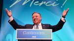 CAQ Leader Francois Legault makes his victory speech to supporters at the Coalition Avenir Quebec election night headquarters, in Quebec City, Monday, Oct. 3, 2022. THE CANADIAN PRESS/Jacques Boissinot 